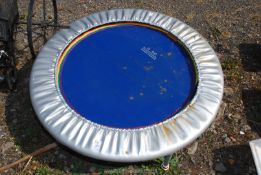 A 'Trimilim' exercise trampoline 41" diameter x 9" high.