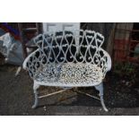 An ornate cast iron garden bench 37" wide x 33" high (16" seat height).