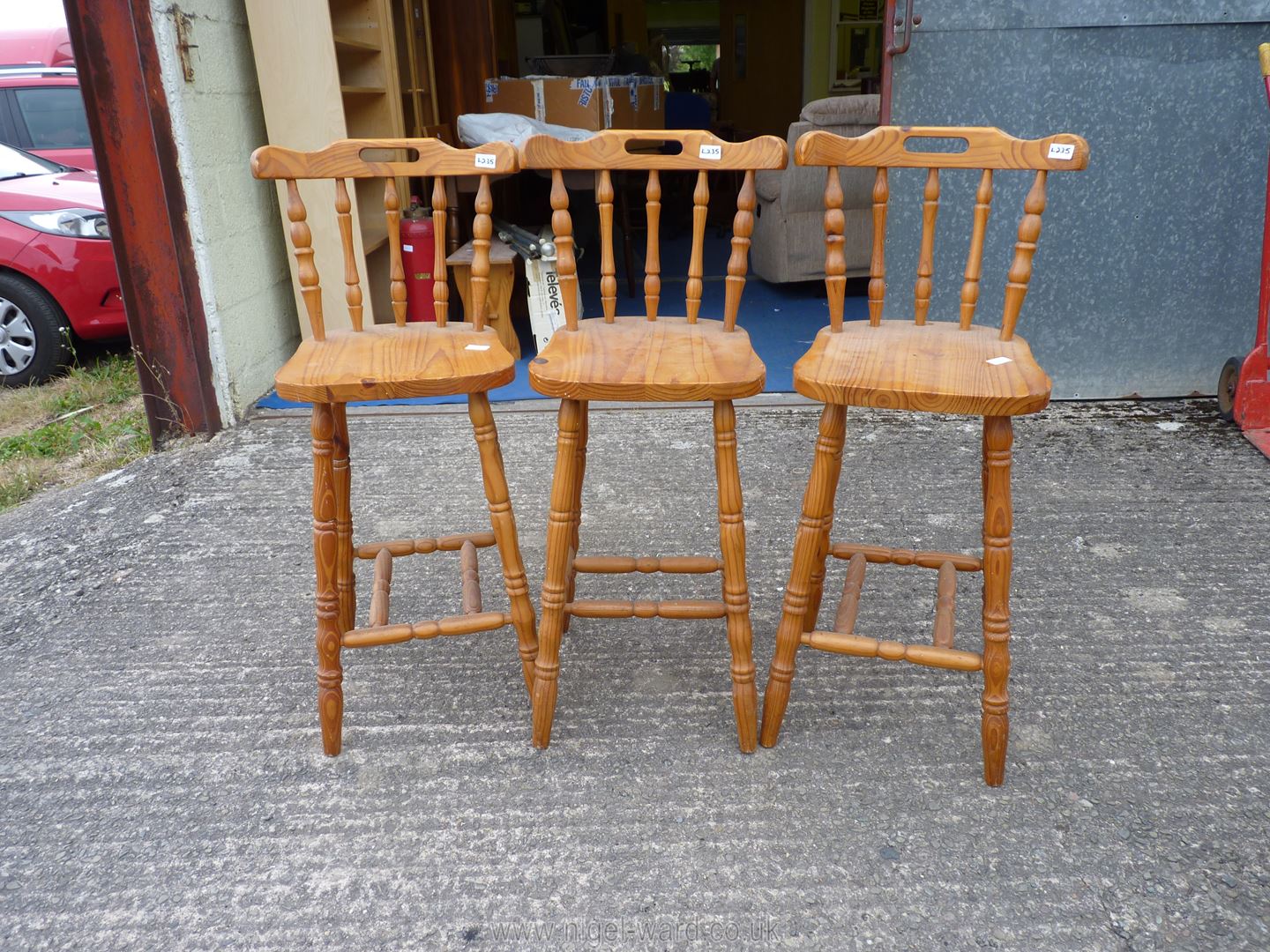 Three pine bar stools.
