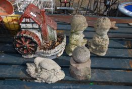 A concrete garden water mill and two concrete children figures, stone ball, etc.