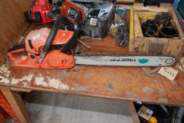 A timber Wolfe chainsaw having good compression, (chain brake casing worn.