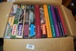 A box of books on medals.