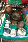 A box of misc including two clocks, tins, Bosch reciprocating cordless saw, etc.