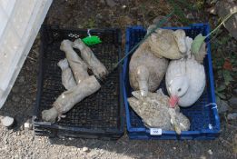 Two crates containing 4 meercats and 4 ducks.