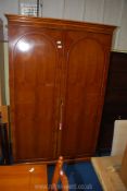 A Yew wood double door wardrobe, 22" x 48" x 79".
