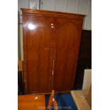 A Yew wood double door wardrobe, 22" x 48" x 79".