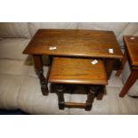 A pair of oak coffee tables.