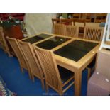 A table and four chairs, the table with granite effect ceramic inserts 35" x 29" x 71" long.