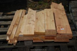 A quantity of short cedar boards.