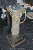 A concrete garden pillar with sundial top in brass, 34" tall.