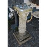 A concrete garden pillar with sundial top in brass, 34" tall.