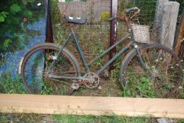 A Ladies Vintage Push Bike.