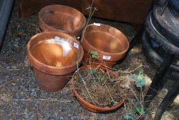 Three terracotta pots 10" diameter x 9" tall and one terracotta bulb pot 19 1/2" diameter x 5" tall.