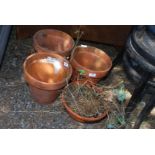 Three terracotta pots 10" diameter x 9" tall and one terracotta bulb pot 19 1/2" diameter x 5" tall.