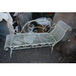 A French style ornate metal garden chaise lounge, approx. 56" long overall x 17".