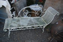 A French style ornate metal garden chaise lounge, approx. 56" long overall x 17".