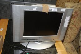 A Flatron LG 15" TV with remote (good working order).