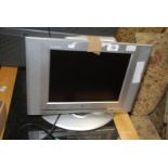 A Flatron LG 15" TV with remote (good working order).