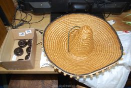 Six round Bakelite light switches and sombrero hat.