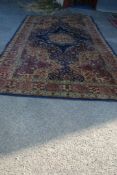 A large Greys Wilton blue & yellow woolen carpet with central medallion 16ft x 9ft (some damage).