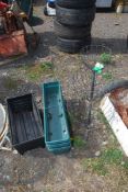 Four plastic window boxes and a metal basket planter.