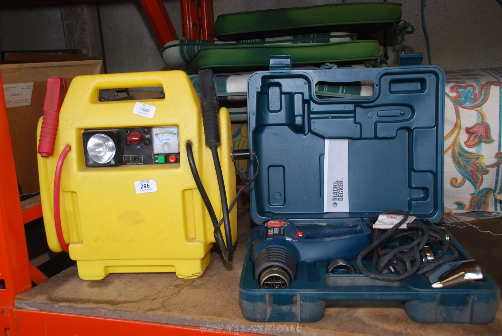 A booster starter (no charger) and a Black & Decker cased hot air gun.