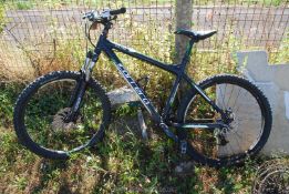 Carrera Vulcan gent's mountain bike with disc brakes and front shocks.