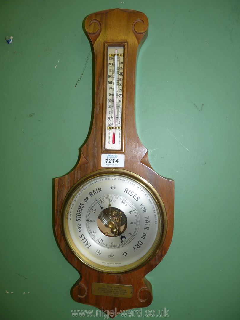 An Aneroid Banjo Barometer with presentation plaque "To Ray Lewis in appreciation of many years of