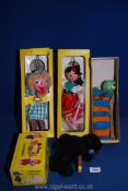 A quantity of Pelham puppets including gypsy farmer, black poodle and caterpillar.