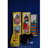 A quantity of Pelham puppets including gypsy farmer, black poodle and caterpillar.