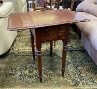 A late George III Mahogany worktable having two shallow drawers to one end,