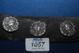 Three Art Nouveau silver buttons, Birmingham 1901, each 1'' diameter.