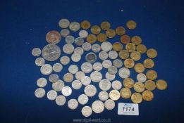 A quantity of old coins to include three pence pieces, six pence pieces, shillings, a half crown,