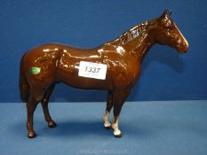 A Beswick Quarter Horse with original sticker 8" tall approximately.