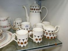 A Royal Stafford bone china coffee set with six cans and saucers, coffee pot, milk jug,