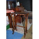 A Zebra wood side table (part of a nest of tables).