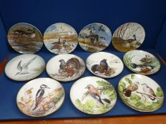 A quantity of Bird display plates to include 10 x Franklin porcelain plates and 4 x Geese plates.
