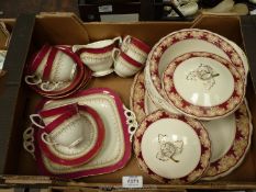 A Royal Worcester part tea service in 'Regency' pattern and a Grindley 'Marborough' part dinner