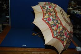 A vintage floral fabric parasol.