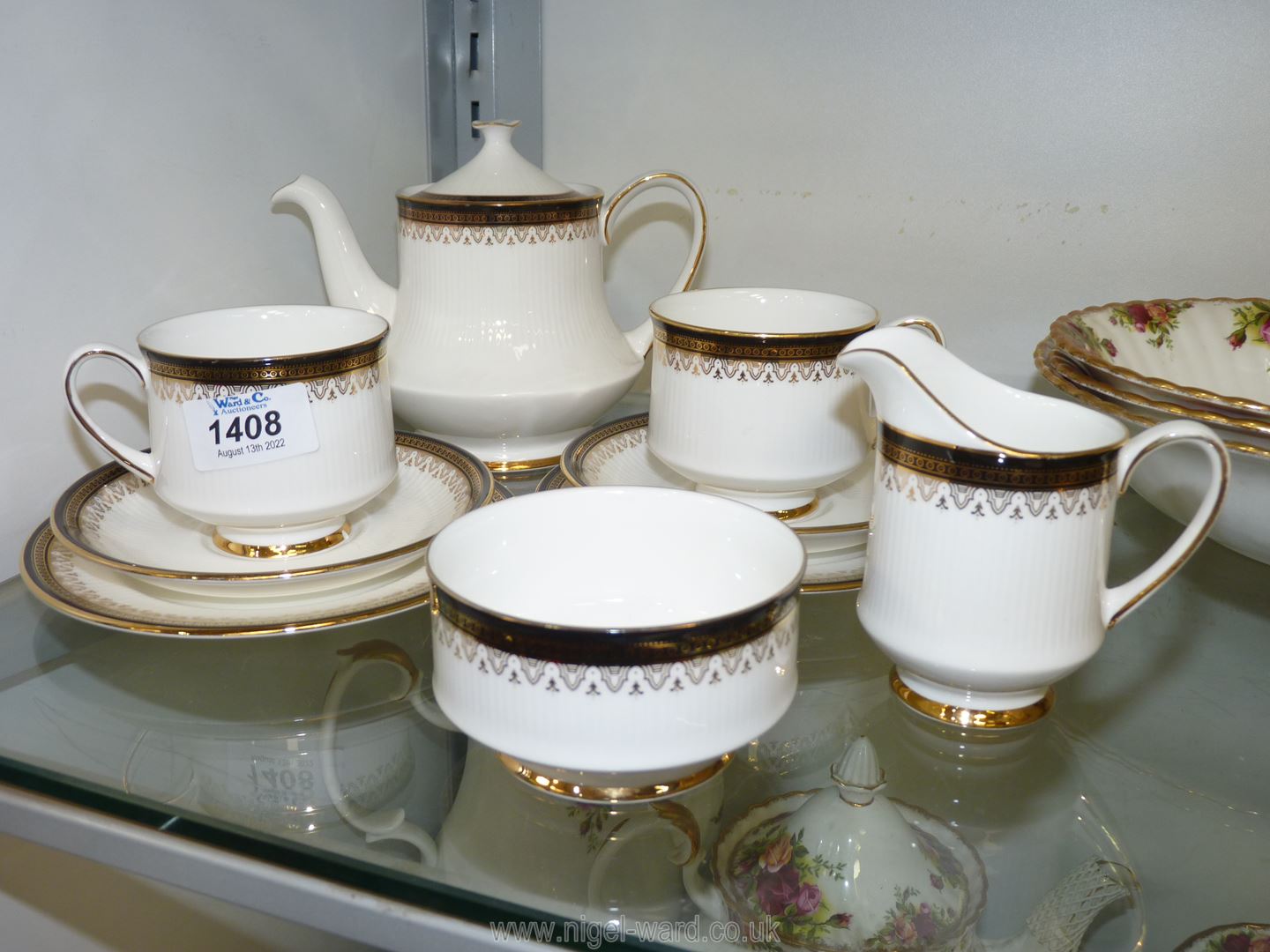 A Paragon 'Clarence' tea set for two to include; cups, saucers, side plates, bowl, jug and teapot.