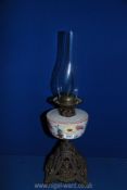 An oil Lamp with metal base and opaque glass bowl, 22" tall.