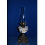 An oil Lamp with metal base and opaque glass bowl, 22" tall.