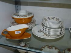 A Poole pottery 'Desert Song' part dinner service including a lidded tureen,