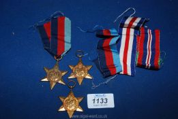 Three WWII medals including The 1939 - 1945 star, The France and Germany star and The Atlantic star,