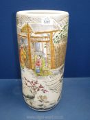 An oriental china stick stand depicting figures and horses in a winter scene, 18" tall.