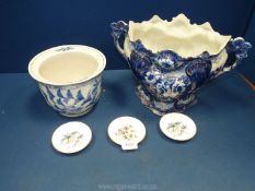 A blue and white china jardiniere with two handles and another smaller oriental style on plus three