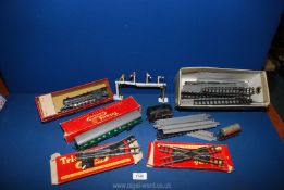 A box of Tri-ang OO gauge to include; track, signal points, restaurant carriage,