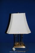 A glass and brass double Lamp and large cream lamp shade, 24" tall.