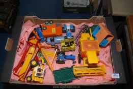 A box of Britains toys including New Holland combine harvester, Krone trailer, horse boxes,