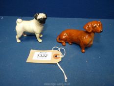 Two Beswick dogs including a tan dachshund in seated position and a fawn pug (slight damage to foot